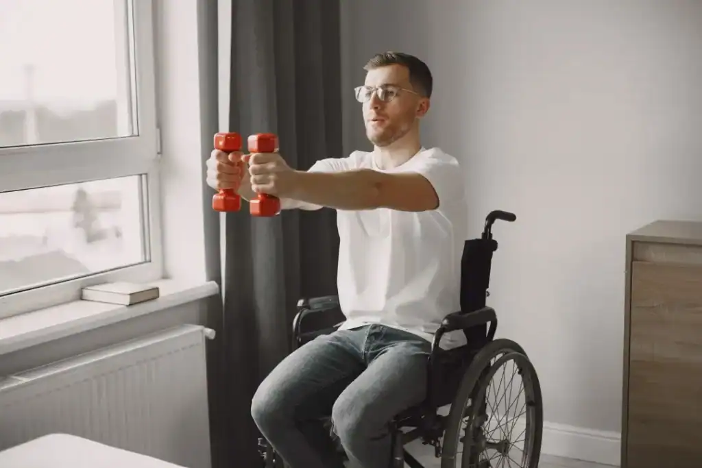 Empowering Weight Loss: A Comprehensive Guide for Individuals with Disabilities 1 Image of man doing exercise in his wheelchair to aid weight loss Rushden