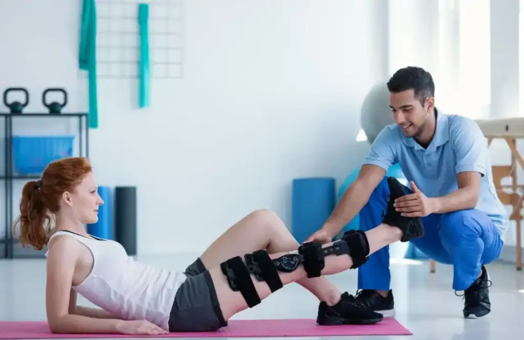 Debunking Meal Timing Myths: The Truth About Muscle Recovery 1 Woman having treatment to help muscle recovery Rushden after an injury